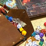 DnD leather dice bag and various DnD dices