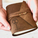 Leather wine tasting journal with School of Wine logo engraved to front cover